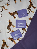 Label 'Normal is boring lila'