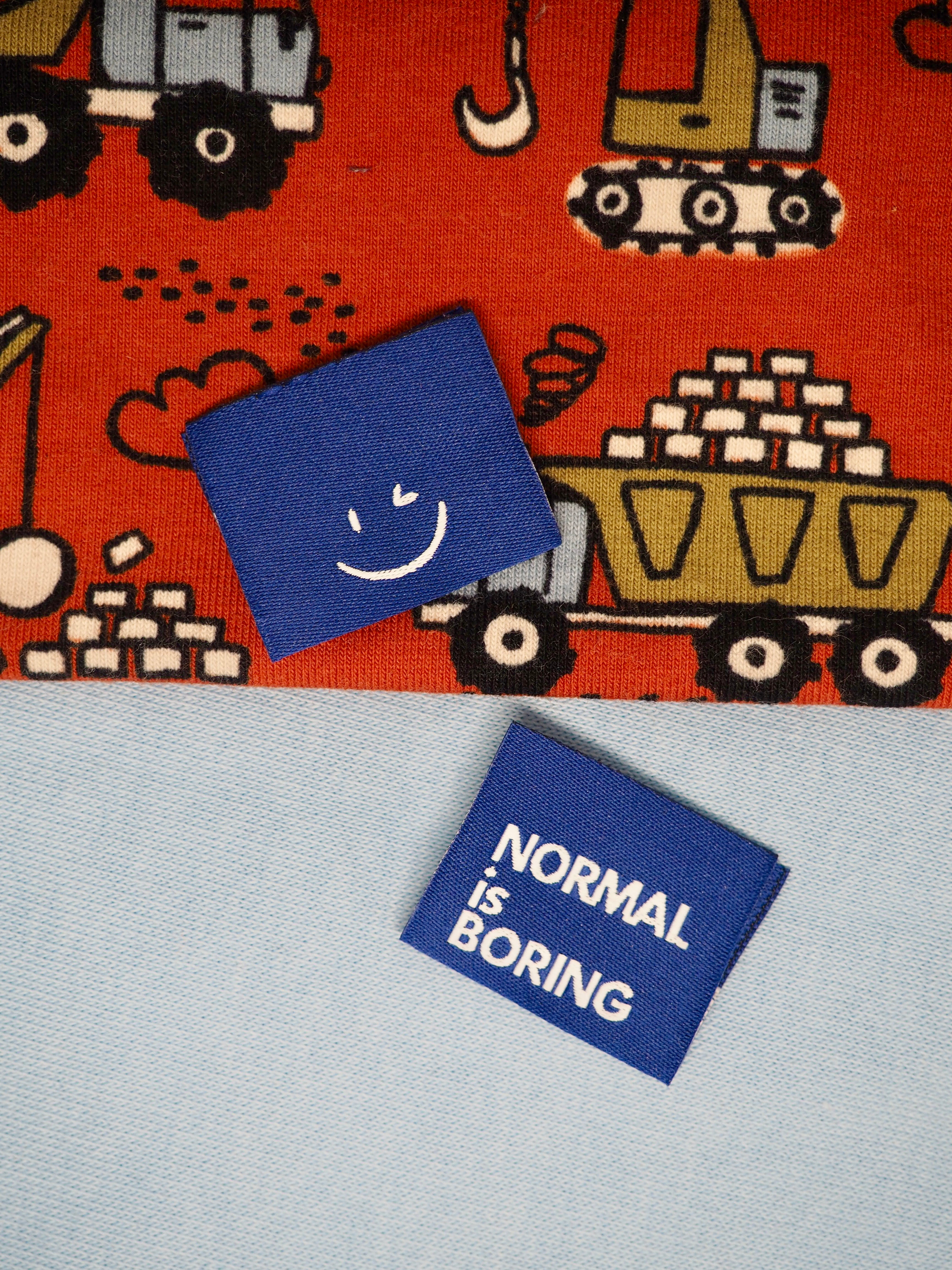 Label 'Normal is boring blauw'