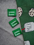 Label 'Normal is boring groen'