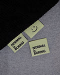 Label 'Normal is boring licht groen'